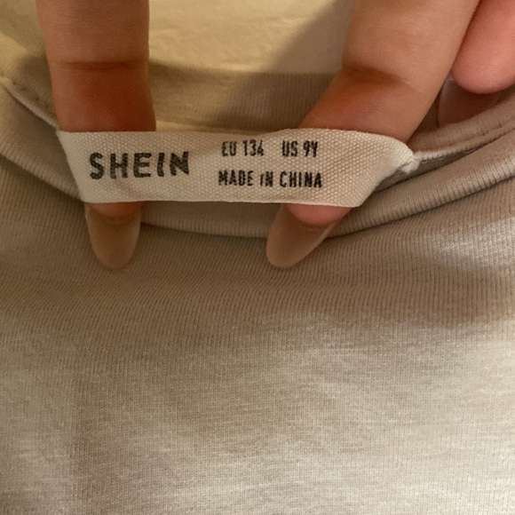 White t-shirt with design on it. - Picture 3 of 3